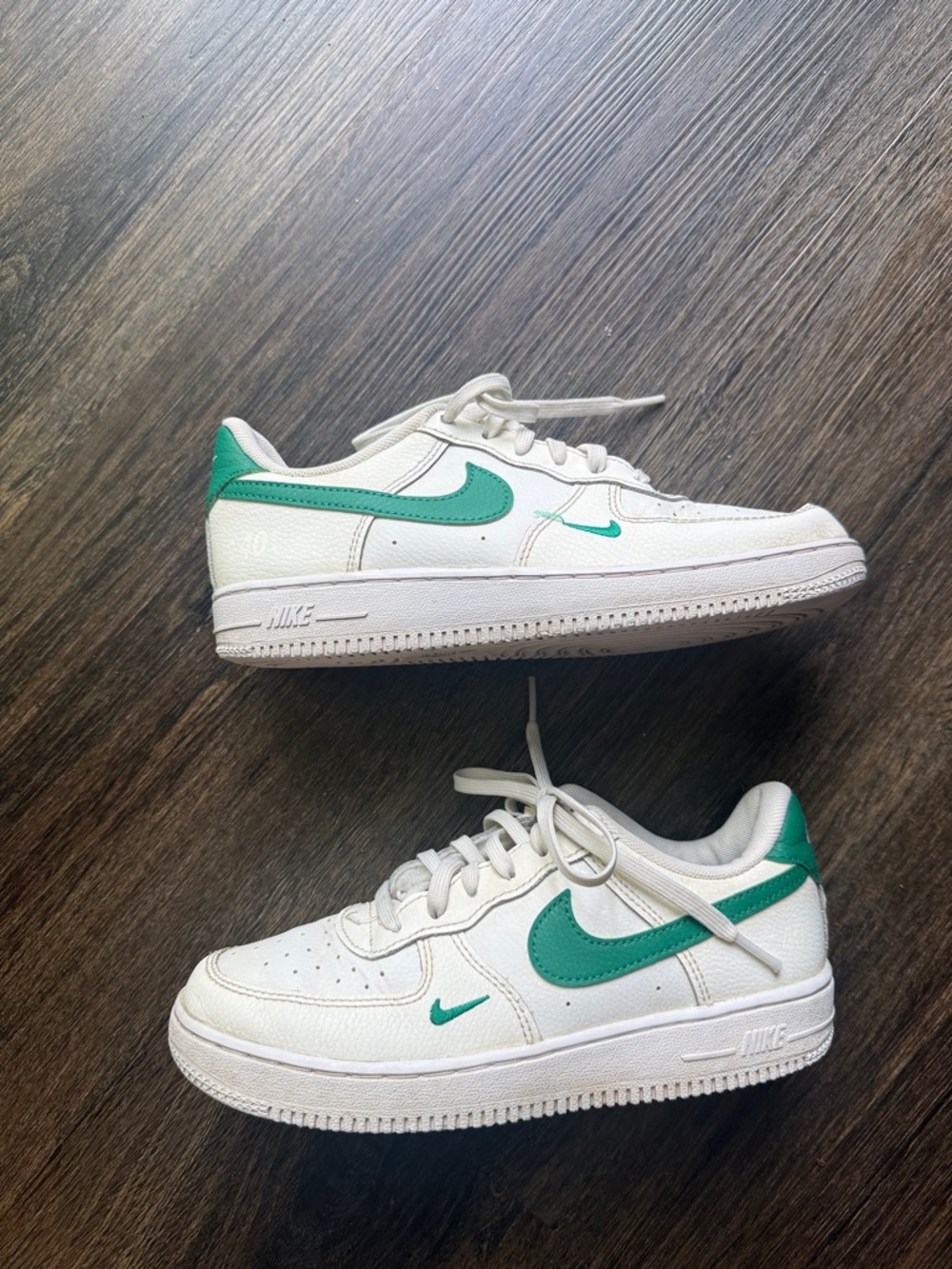 Nike White Low-Top Sneakers with Green Swoosh